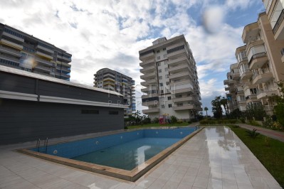 Просторная квартира 2+1 с отдельной кухней в районе Махмутлар с 50 м от моря фото 3