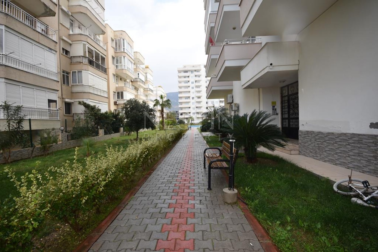 Просторная квартира 2+1 с отдельной кухней в районе Махмутлар с 50 м от моря фото 4