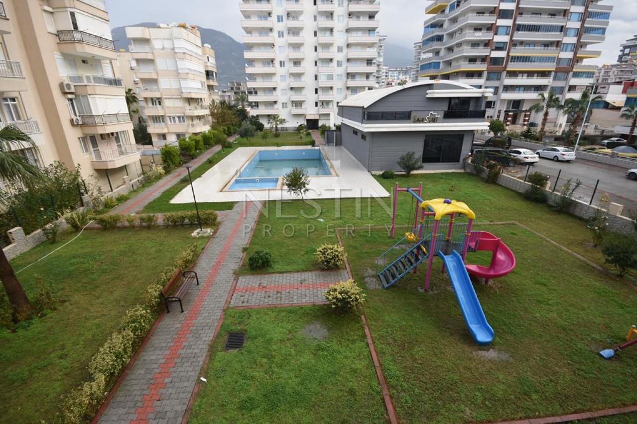 Просторная квартира 2+1 с отдельной кухней в районе Махмутлар с 50 м от моря фото 5