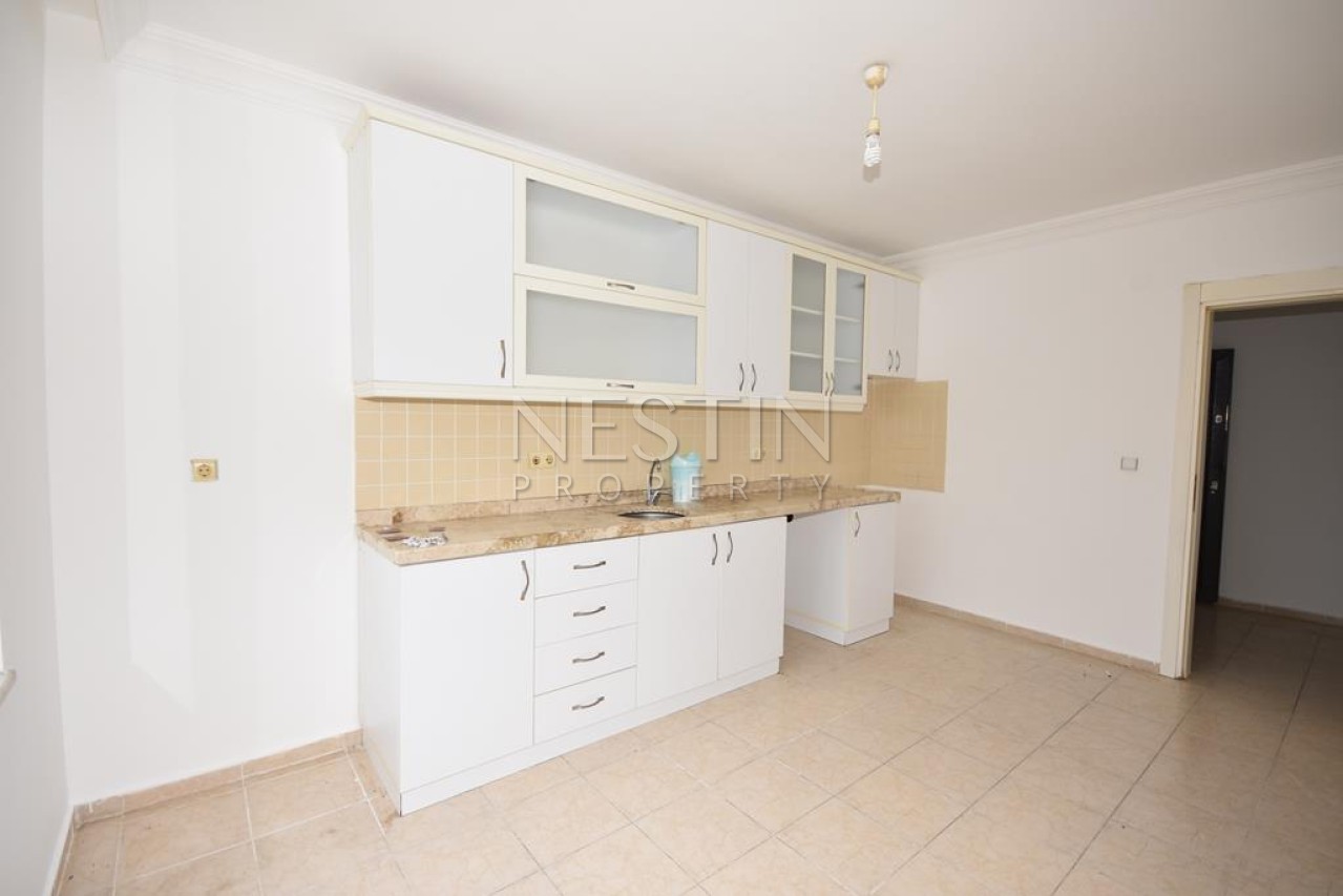 Просторная квартира 2+1 с отдельной кухней в районе Махмутлар с 50 м от моря фото 19