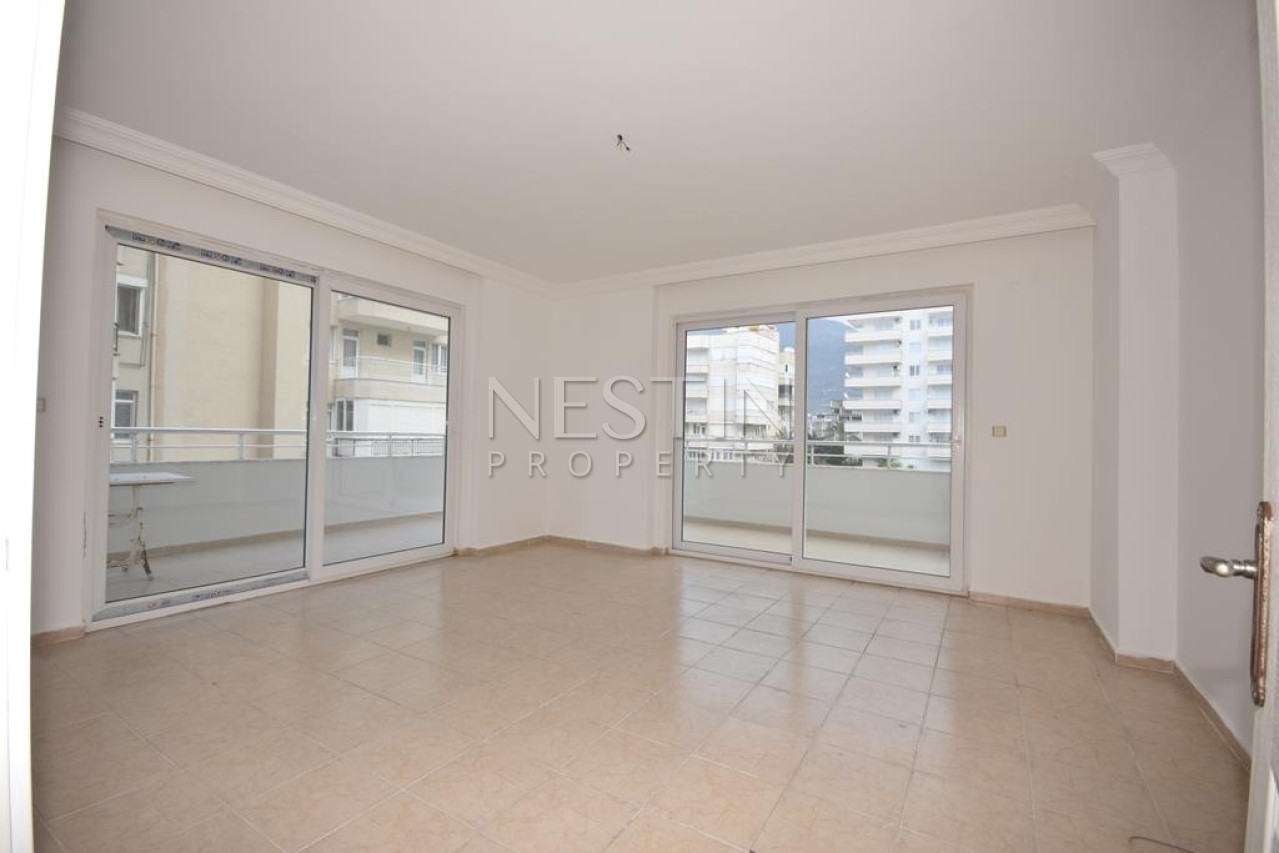 Просторная квартира 2+1 с отдельной кухней в районе Махмутлар с 50 м от моря фото 20