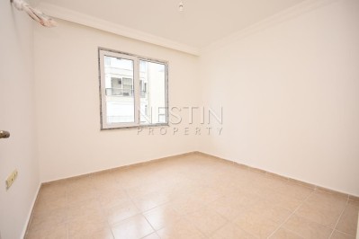 Просторная квартира 2+1 с отдельной кухней в районе Махмутлар с 50 м от моря фото 22