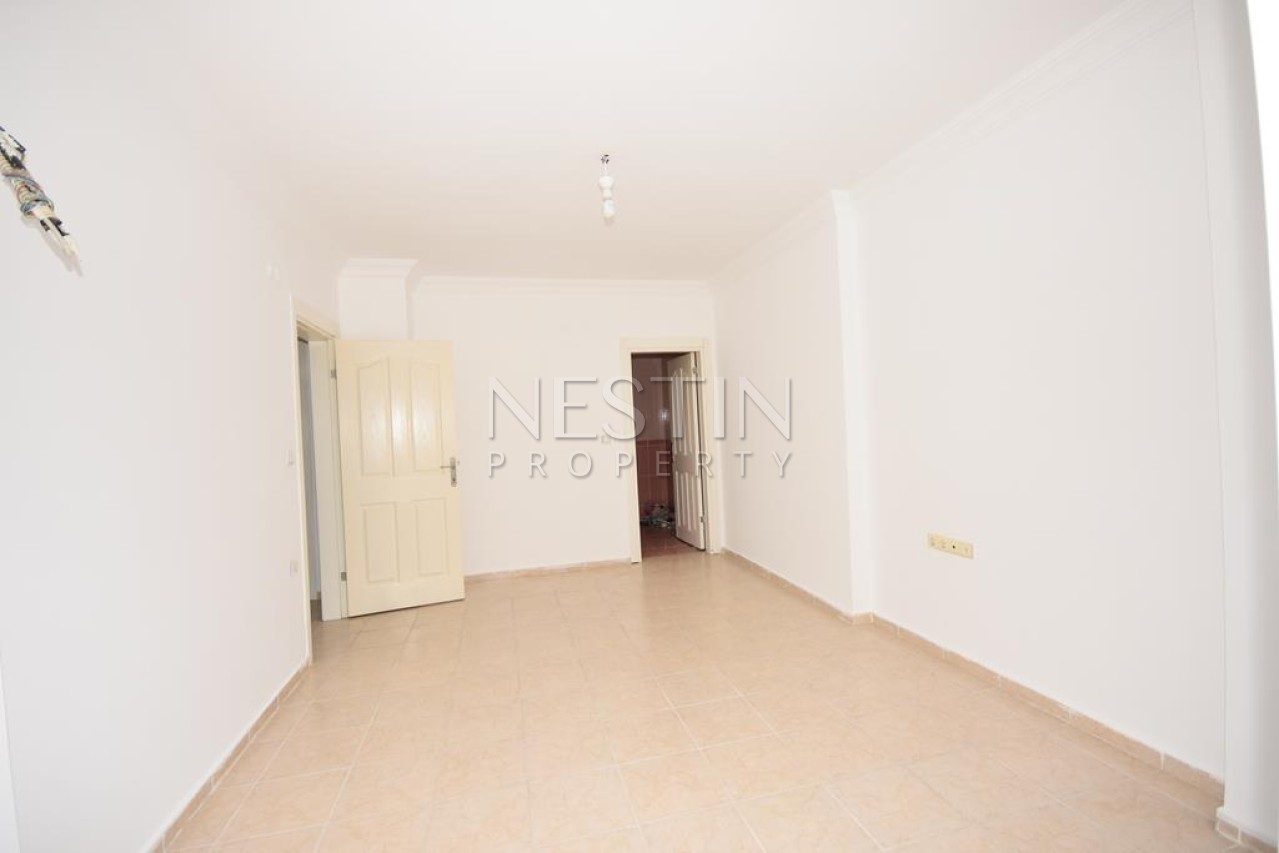 Просторная квартира 2+1 с отдельной кухней в районе Махмутлар с 50 м от моря фото 24