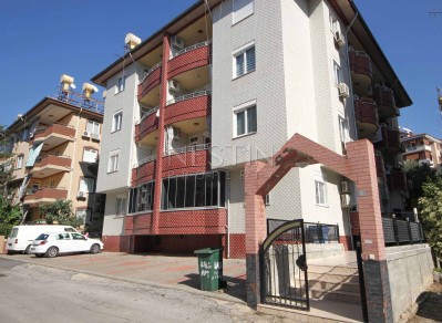 Уютная квартира 2+1 с дизайнерским оформлением в центре Алании фото 1