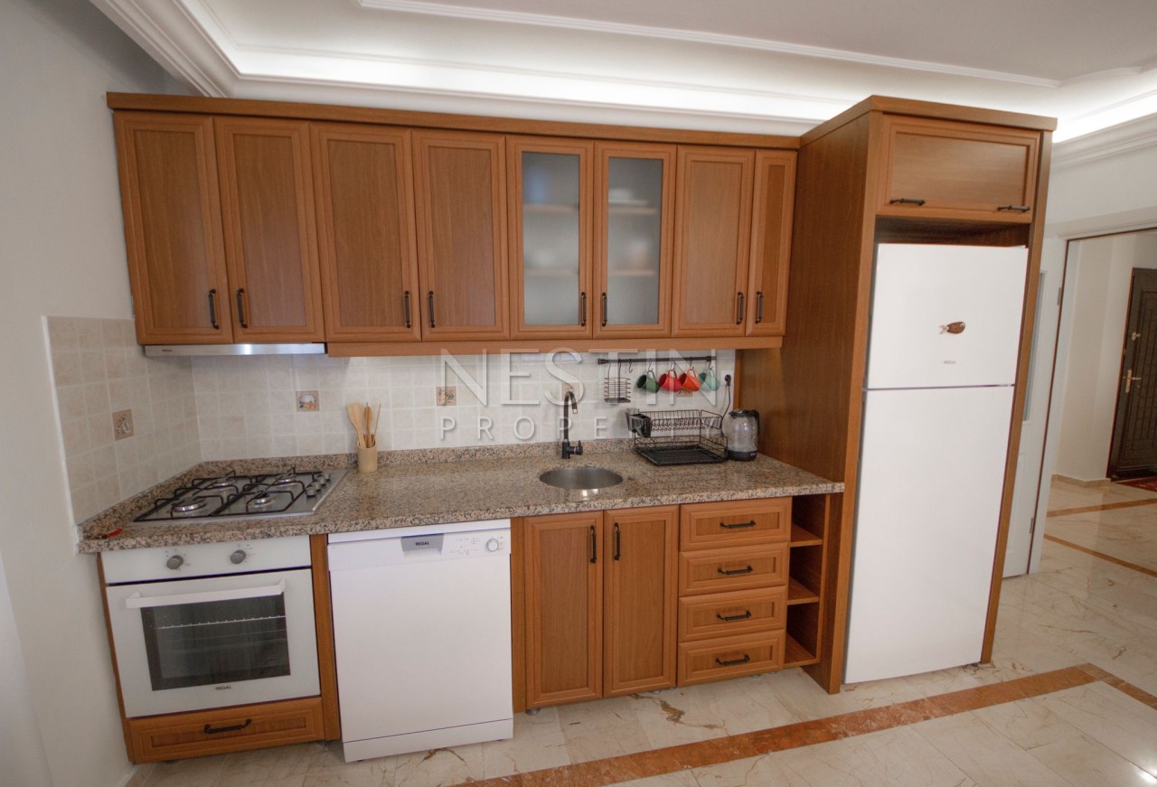 Уютная квартира 2+1 с дизайнерским оформлением в центре Алании фото 7