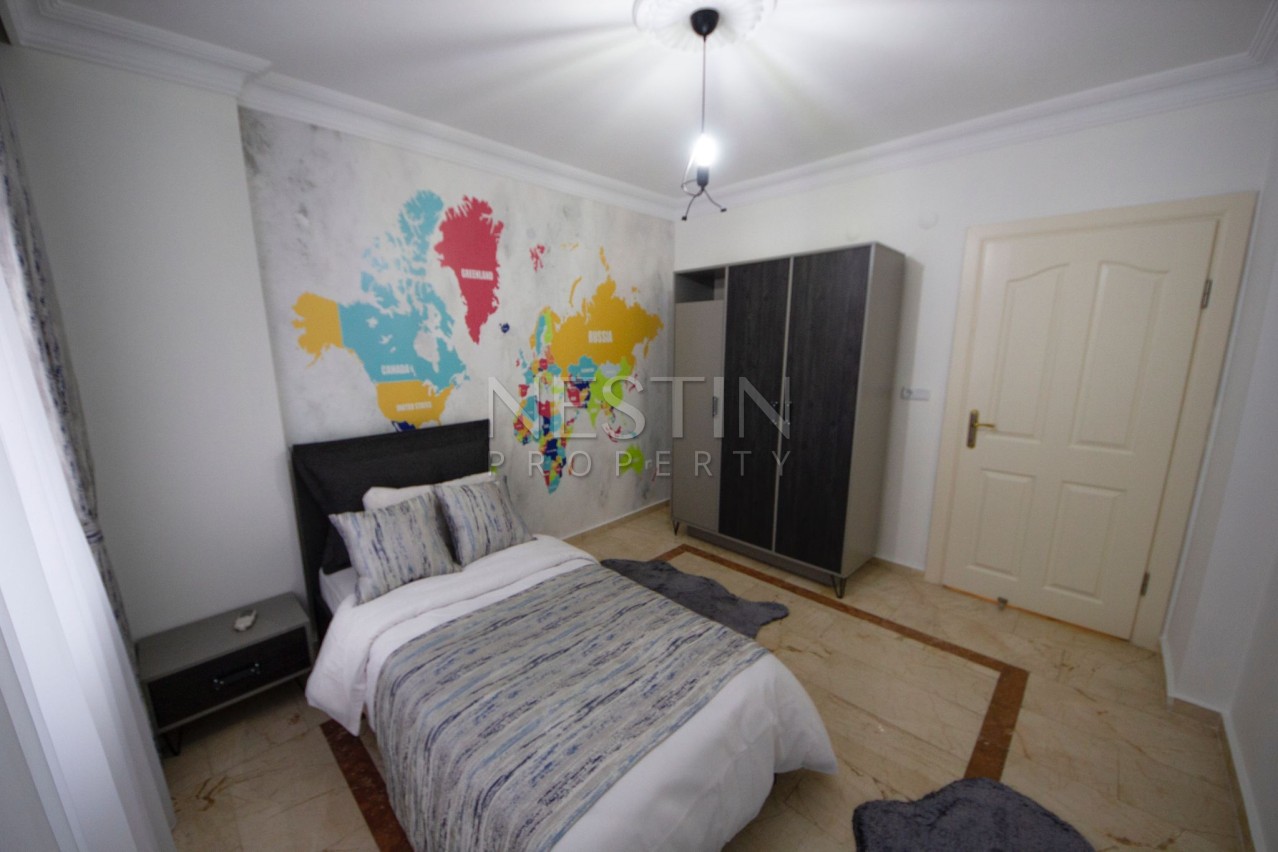 Уютная квартира 2+1 с дизайнерским оформлением в центре Алании фото 14