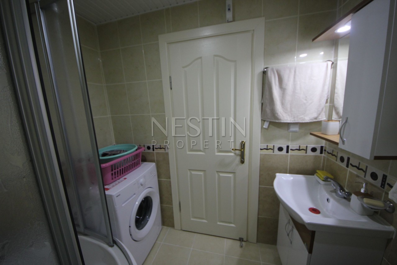 Уютная квартира 2+1 с дизайнерским оформлением в центре Алании фото 17