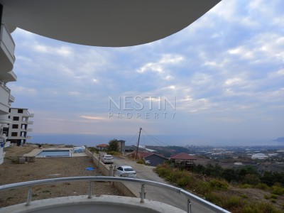 Квартира 2+1 в новом комплексе района Махмутлар с видом на море и горы фото 11