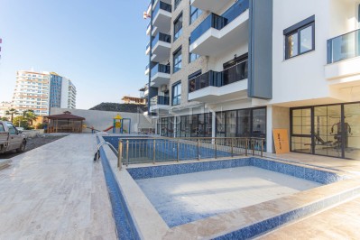 Апартаменты 1+1 в новом комплексе района Махмутлар в 400 м от моря фото 4