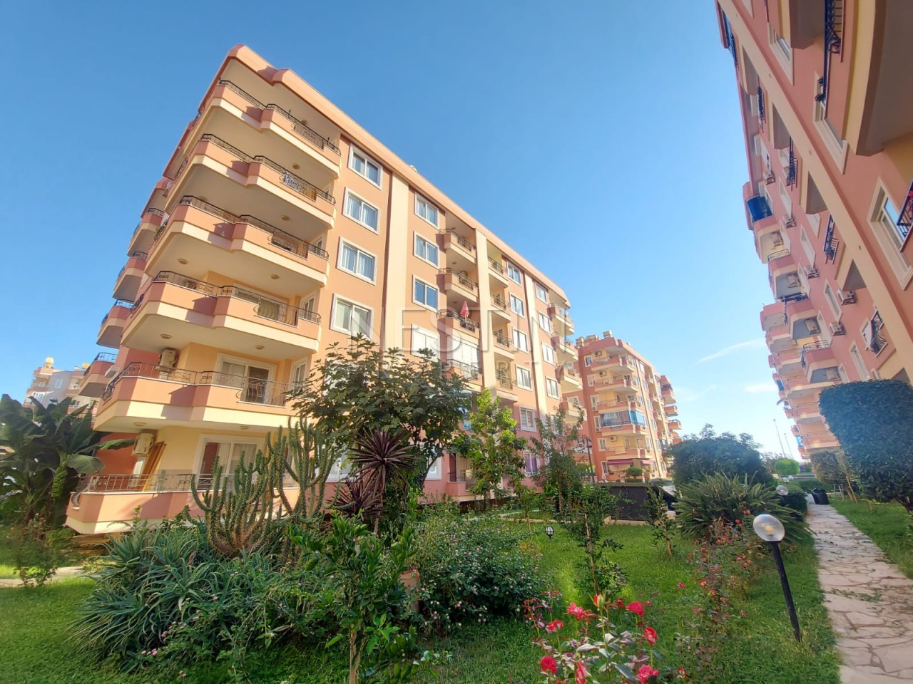 Уютная квартира 2+1 в районе Махмутлар с частичным видом на море фото 5