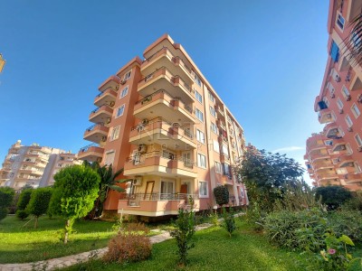 Уютная квартира 2+1 в районе Махмутлар с частичным видом на море фото 6