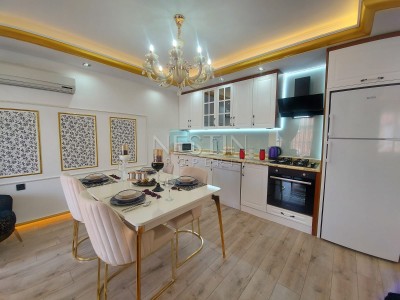 Уютная квартира 2+1 в районе Махмутлар с частичным видом на море фото 7