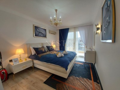 Уютная квартира 2+1 в районе Махмутлар с частичным видом на море фото 12