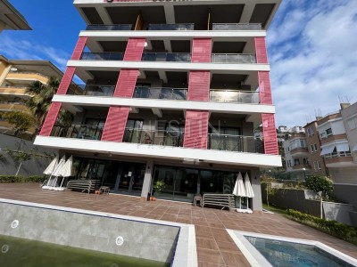 Квартира 1+1 в большой террасой в новом ЖК в центре города Аланья фото 2