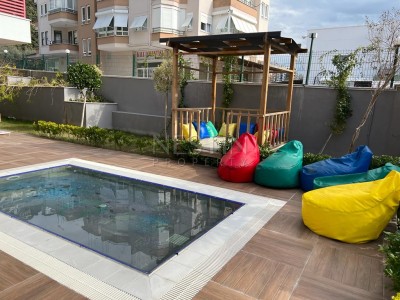 Квартира 1+1 в большой террасой в новом ЖК в центре города Аланья фото 6