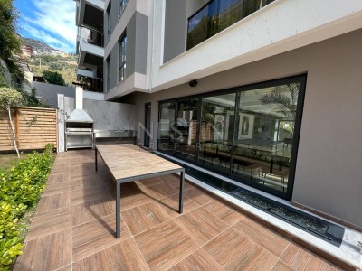 Квартира 1+1 в большой террасой в новом ЖК в центре города Аланья фото 7