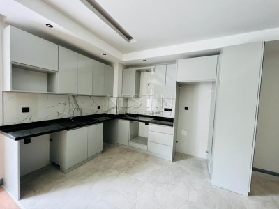 Квартира 1+1 в большой террасой в новом ЖК в центре города Аланья фото 21