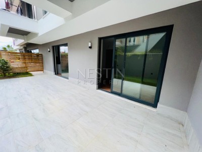 Квартира 1+1 в большой террасой в новом ЖК в центре города Аланья фото 27