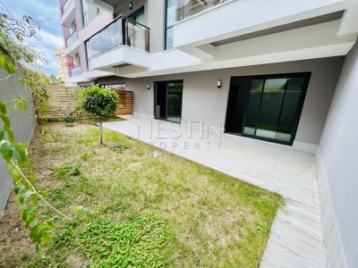 Квартира 1+1 в большой террасой в новом ЖК в центре города Аланья фото 28