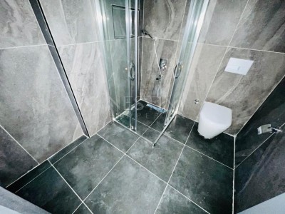 Квартира 1+1 в большой террасой в новом ЖК в центре города Аланья фото 31