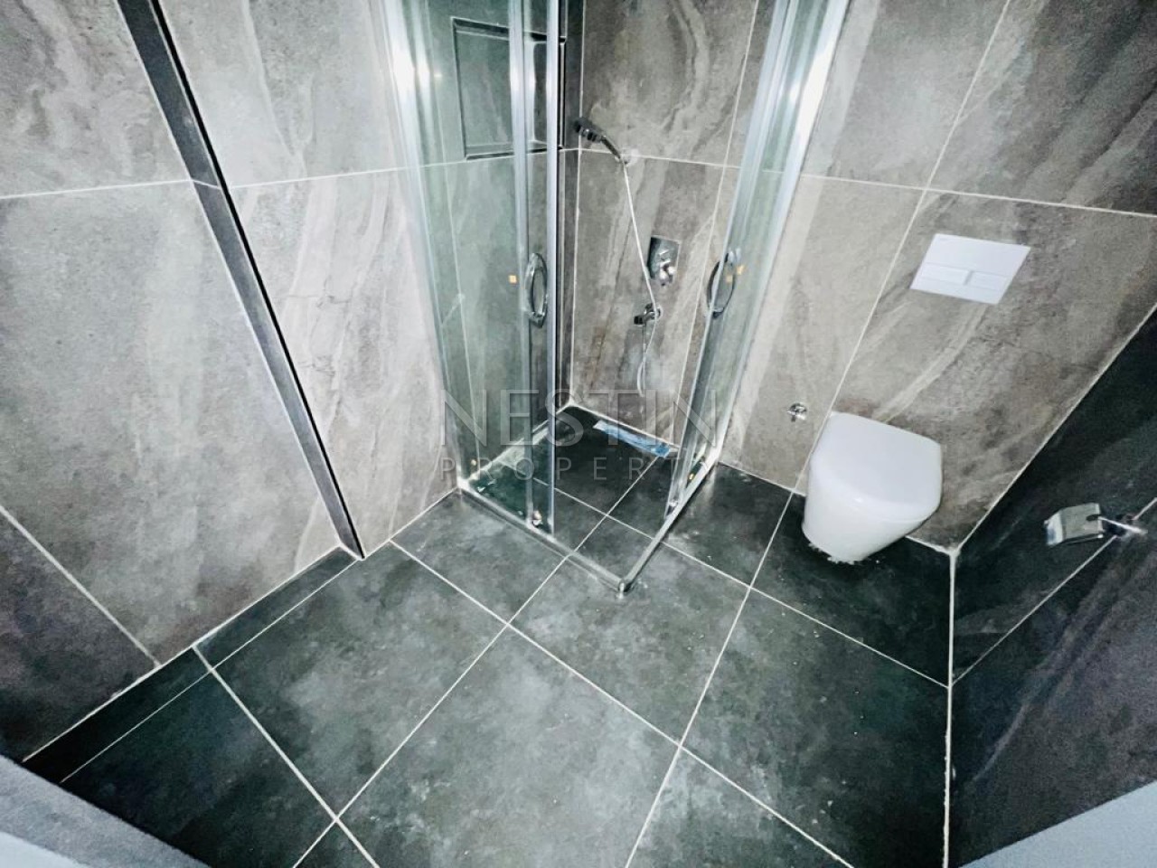 Квартира 1+1 в большой террасой в новом ЖК в центре города Аланья фото 31