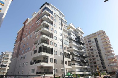 Уютная квартира 1+1 в популярном районе Махмутлар фото 1