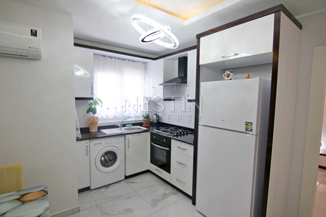 Уютная квартира 1+1 в популярном районе Махмутлар фото 16