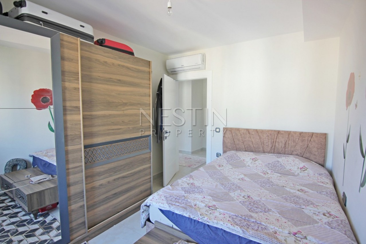 Квартира 2+1 в районе Махмутлар с видом на море и горы фото 23