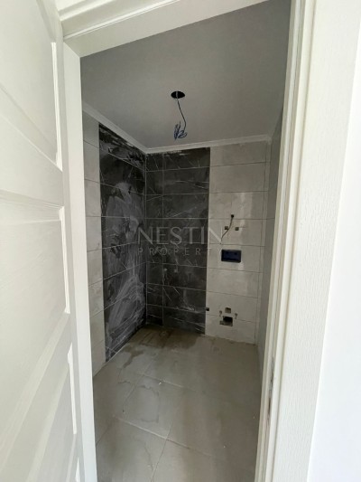 Квартира пентхаус 1+1 в новом доме района Кестель в 100 м от моря фото 14