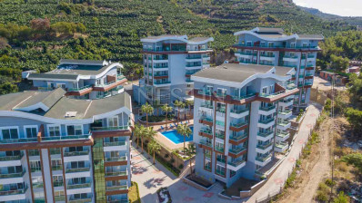 Стильные апартаменты 1+1 в районе Каргыджак в 450 м от моря фото 2