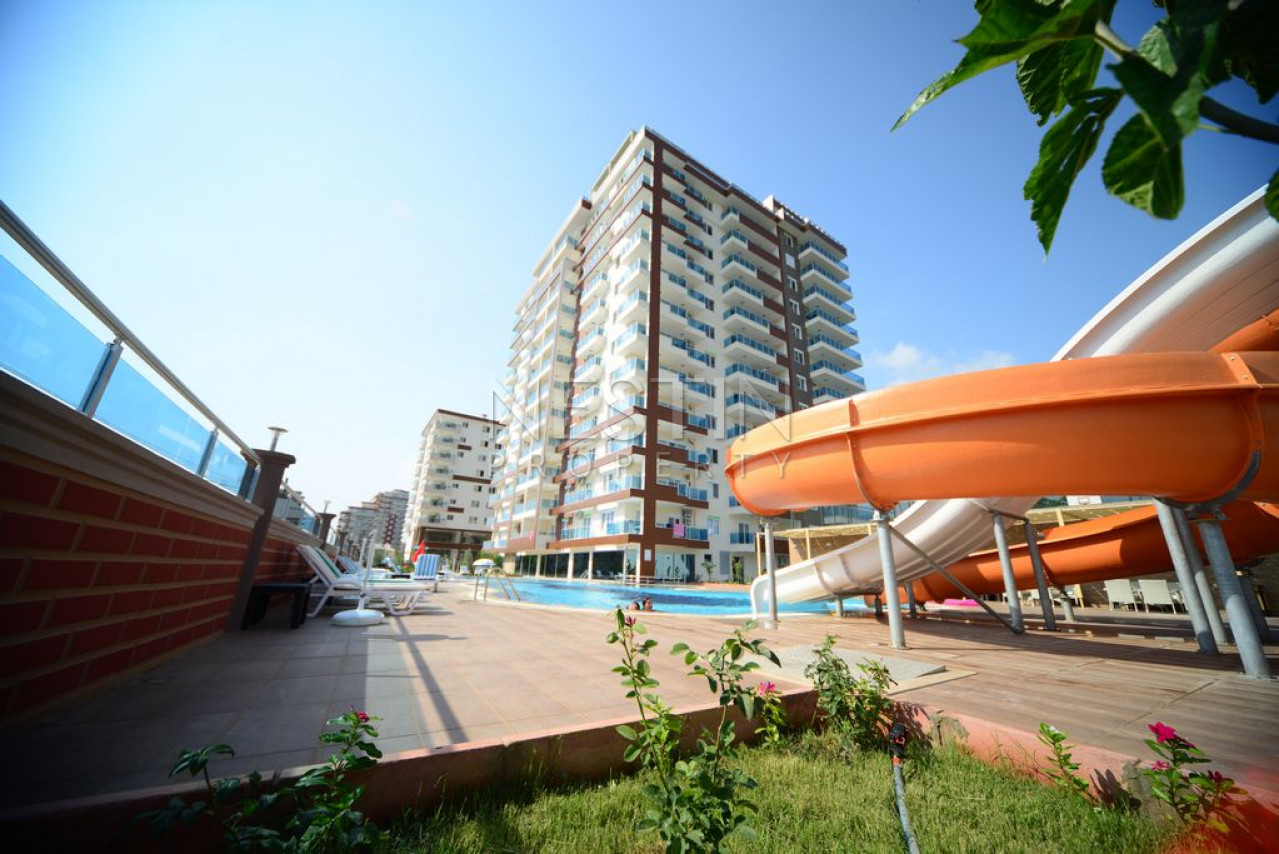 Просторная квартира 1+1 в хорошем комплексе района Махмутлар фото 1