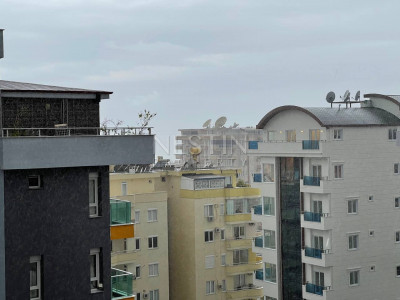 Просторная квартира 1+1 в хорошем комплексе района Махмутлар фото 53