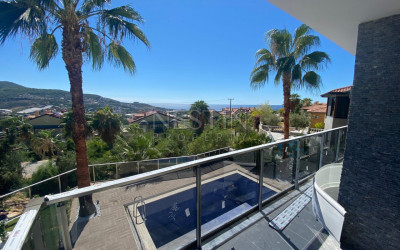 Вилла 3+1 в районе Каргыджак с красивым видом на море и горы фото 14