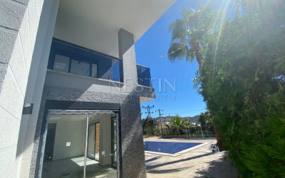 Вилла 3+1 в районе Каргыджак с красивым видом на море и горы фото 18