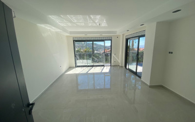 Вилла 3+1 в районе Каргыджак с красивым видом на море и горы фото 22