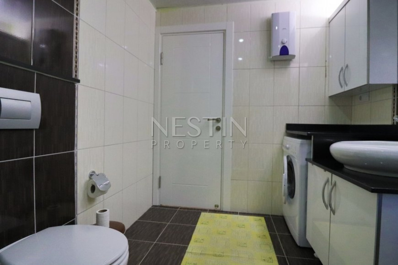 Просторная квартира 1+1 в районе Кестель с красивым видом фото 24