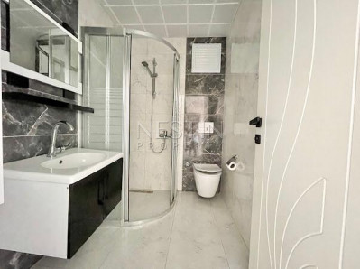 Квартира 1+1 в новом доме района Махмутлар в 300 м от моря фото 8