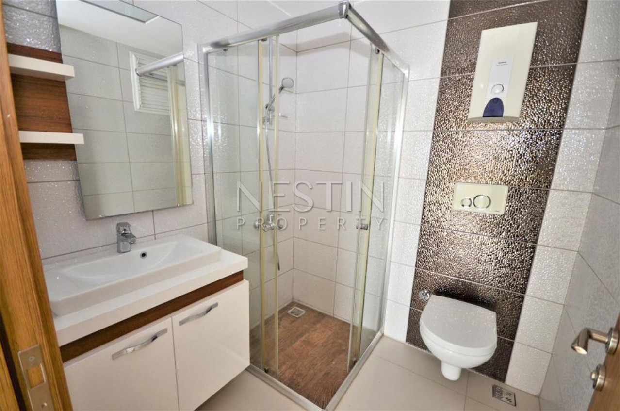 Большая квартира пентхаус 5+1 в районе Махмутлар с красивым видом фото 28