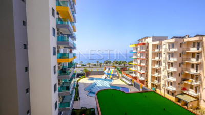 Квартира 2+1 в новом комплексе в районе Махмутлар с видом на море фото 1