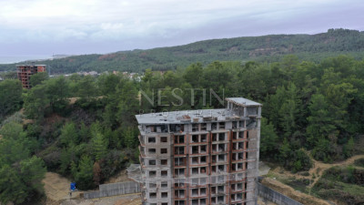 Квартира 1+1 в комплексе на этапе завершения строительства в районе Авсаллар фото 35
