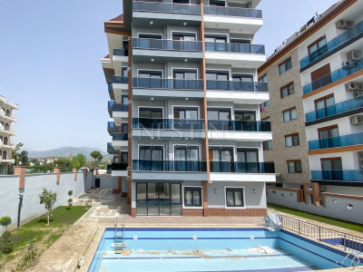 Садовый дуплекс 2+1 в Кестеле в 150 метрах от моря фото 1