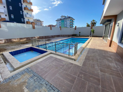 Садовый дуплекс 2+1 в Кестеле в 150 метрах от моря фото 2