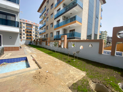 Садовый дуплекс 2+1 в Кестеле в 150 метрах от моря фото 3