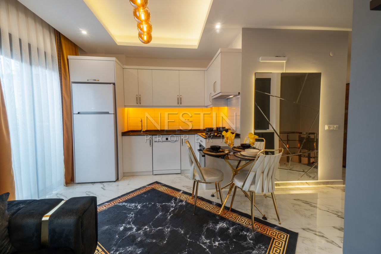 Садовый дуплекс 2+1 в Кестеле в 150 метрах от моря фото 5