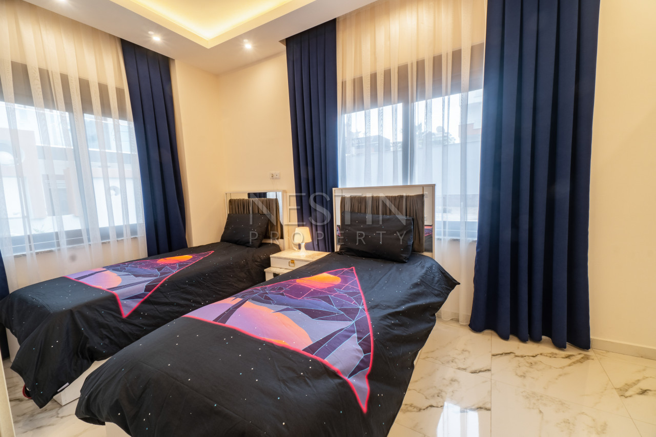 Садовый дуплекс 2+1 в Кестеле в 150 метрах от моря фото 12