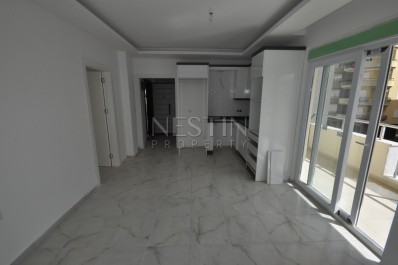 Новая квартира 1+1 в резиденции в Махмутларе по низкой цене фото 7