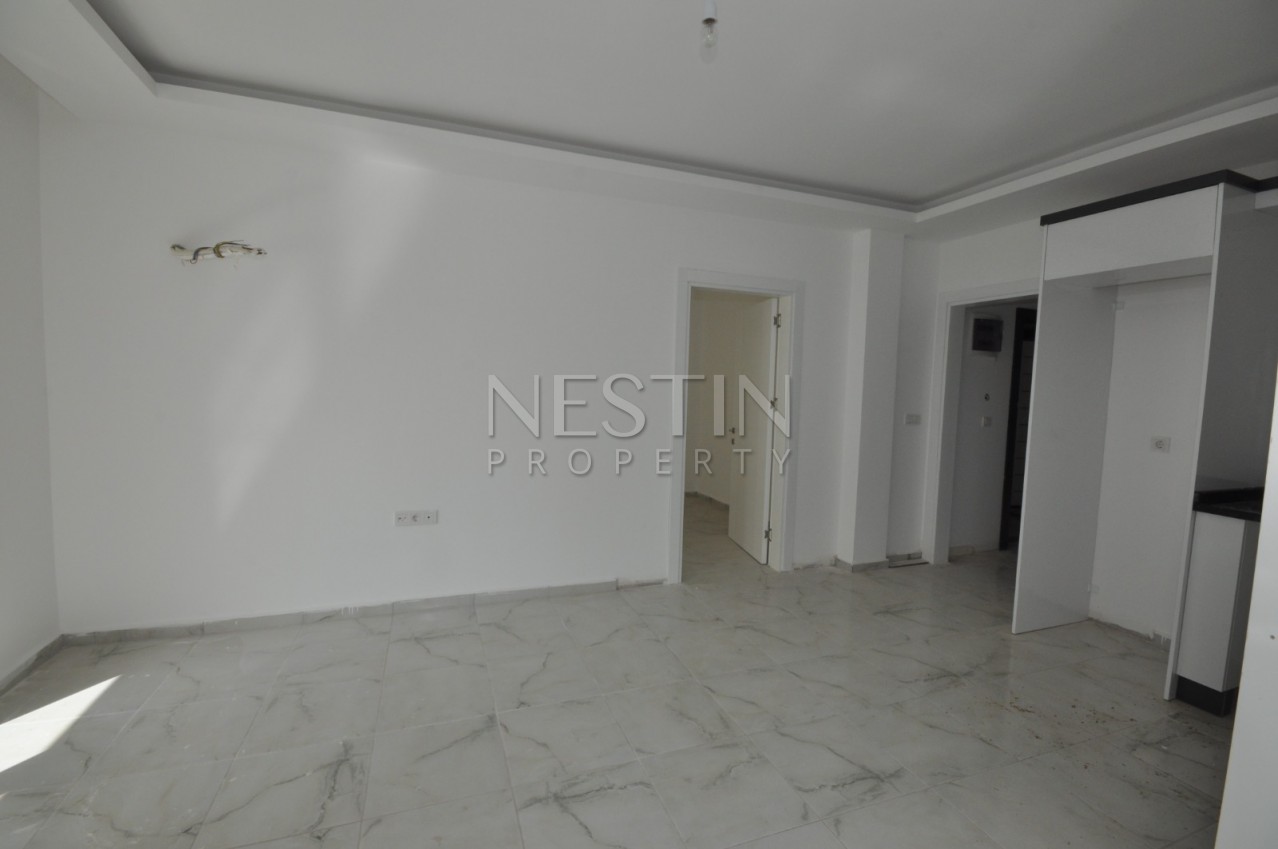 Новая квартира 1+1 в резиденции в Махмутларе по низкой цене фото 10