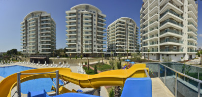 Просторная квартира 1+1 в районе Авсаллар, в доме с отельной инфраструктурой фото 1