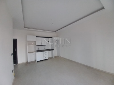 Квартира 1+1 в районе Махмутлар фото 1