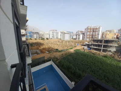 Квартира 1+1 в районе Махмутлар фото 9